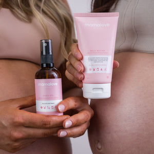 Two pregnant women, one holding Mamalove Belly Butter and the other holding Mamalove Body Oil